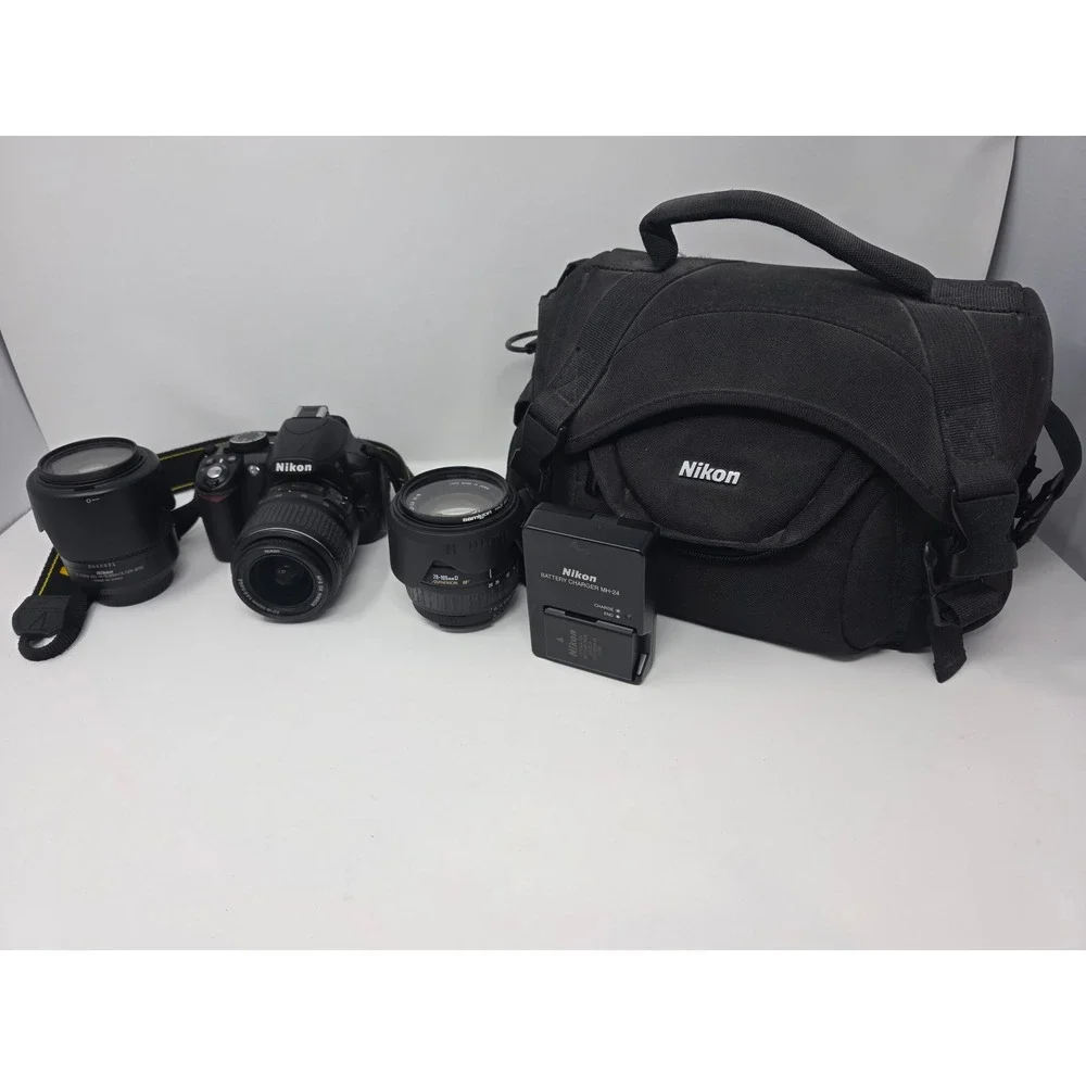 Nikon D3100 DSLR Camera Bundle 18-55mm 35mm 70-300mm Lenses Case Charger